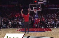 Clippers fan wins a jeep by hitting half court shot