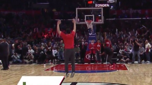 Clippers fan wins a jeep by hitting half court shot