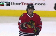 Blackhawks’ Andrew Shaw bunts puck out of air baseball style