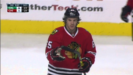 Blackhawks’ Andrew Shaw bunts puck out of air baseball style