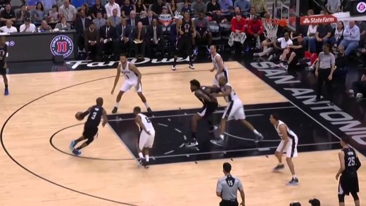 Chris Paul shakes a shoeless Patty Mills