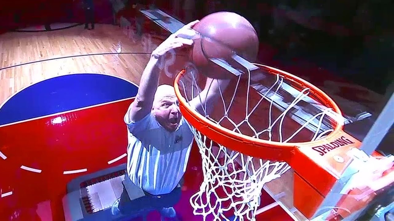 Clippers owner Steve Ballmer dunks ball off trampoline