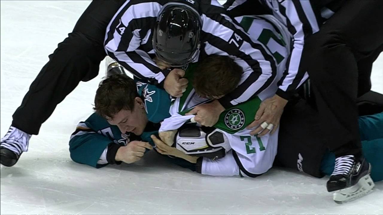 Dallas Stars' Roussel grabs San Jose Sharks' Wingels hair during fight