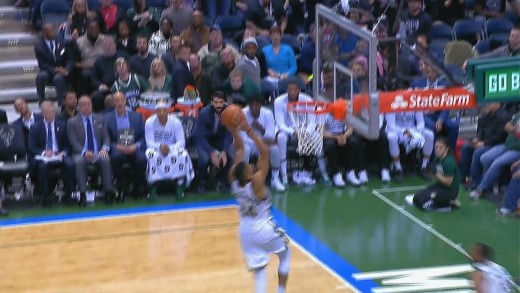 Greek Freak throws down the off the back board slam