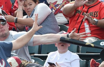 Hero dad saves his son from flying baseball bat