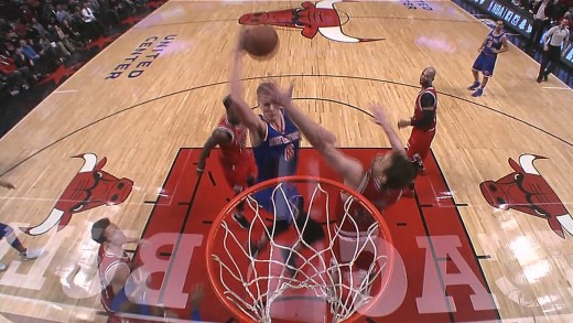 Kristaps Porzingis throws down the slam on Pau Gasol