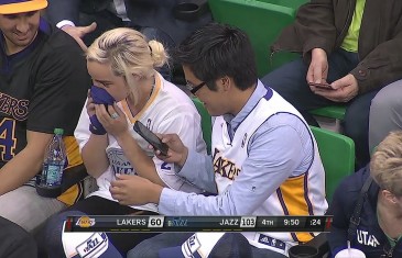 Lakers fan smells Kobe Bryant’s sleeve after fighting over it