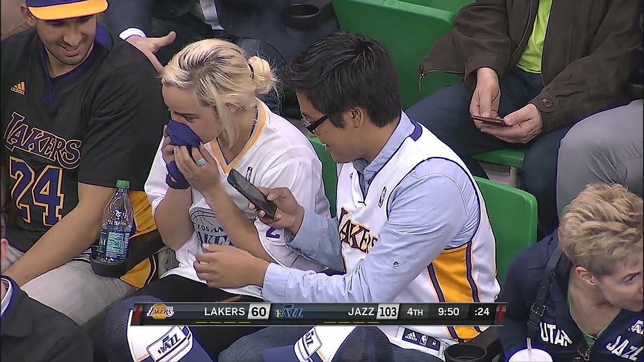 Lakers fan smells Kobe Bryant's sleeve after fighting over it