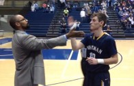 College basketball coach has a cool handshake with all of his players