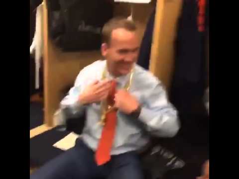 Peyton Manning hitting the dab with Emmanuel Sander's chains