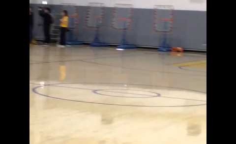 Stephen Curry hits full court golf putt