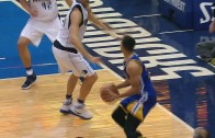 Stephen Curry hits the 3 pointer over Dirk Nowitzki