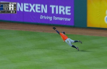George Springer lays out to rob Prince Fielder of extra bases