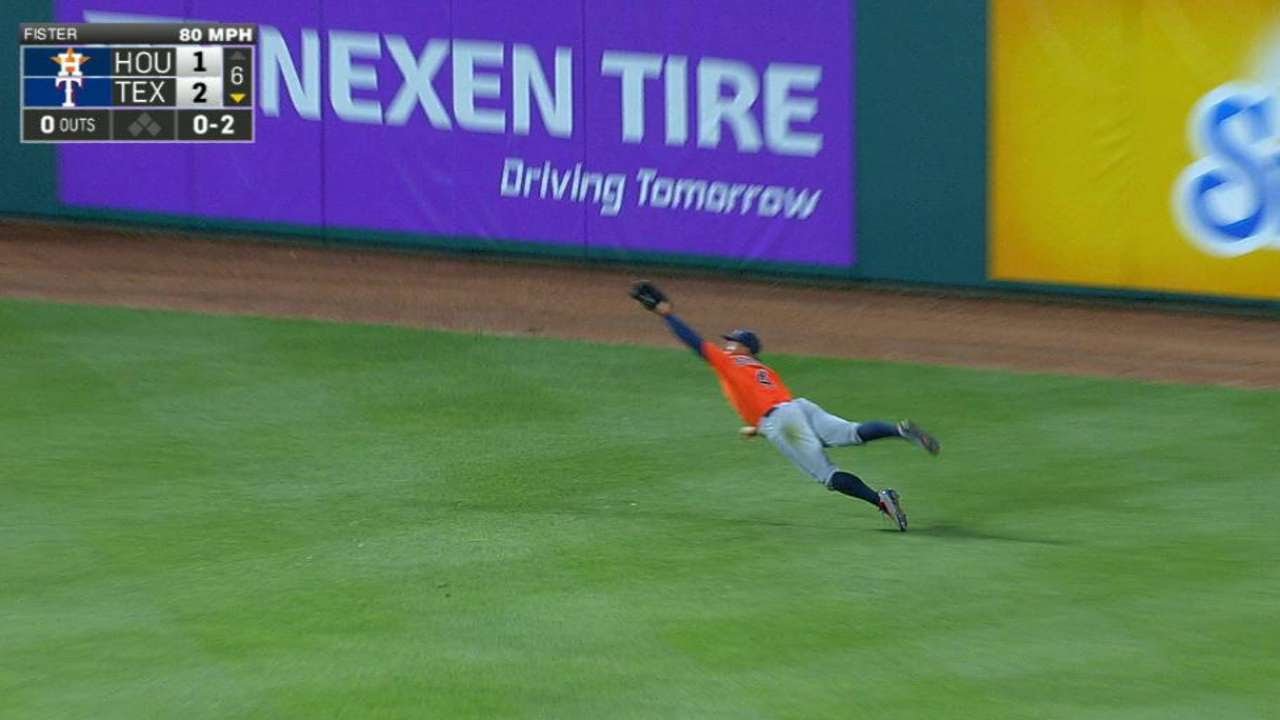 George Springer lays out to rob Prince Fielder of extra bases