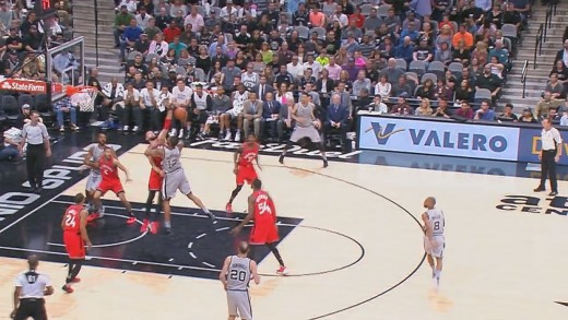 Jonas Valanciunas swats LaMarcus Aldridge’s hook shot