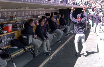 Juan Uribe breaks off some dance moves in the dugout