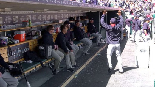 Juan Uribe breaks off some dance moves in the dugout