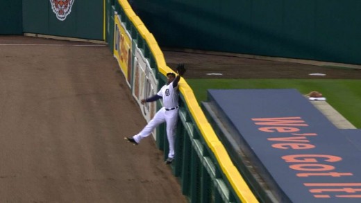 Justin Upton tips ball to himself to rob a home run