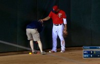 Minnesota Twins staff bring out the duct tape to tape outfield wall