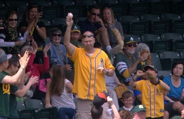 Oakland A’s fan snags foul ball while holding his beer