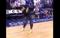 Stephen Curry practices his putting stroke pre-game