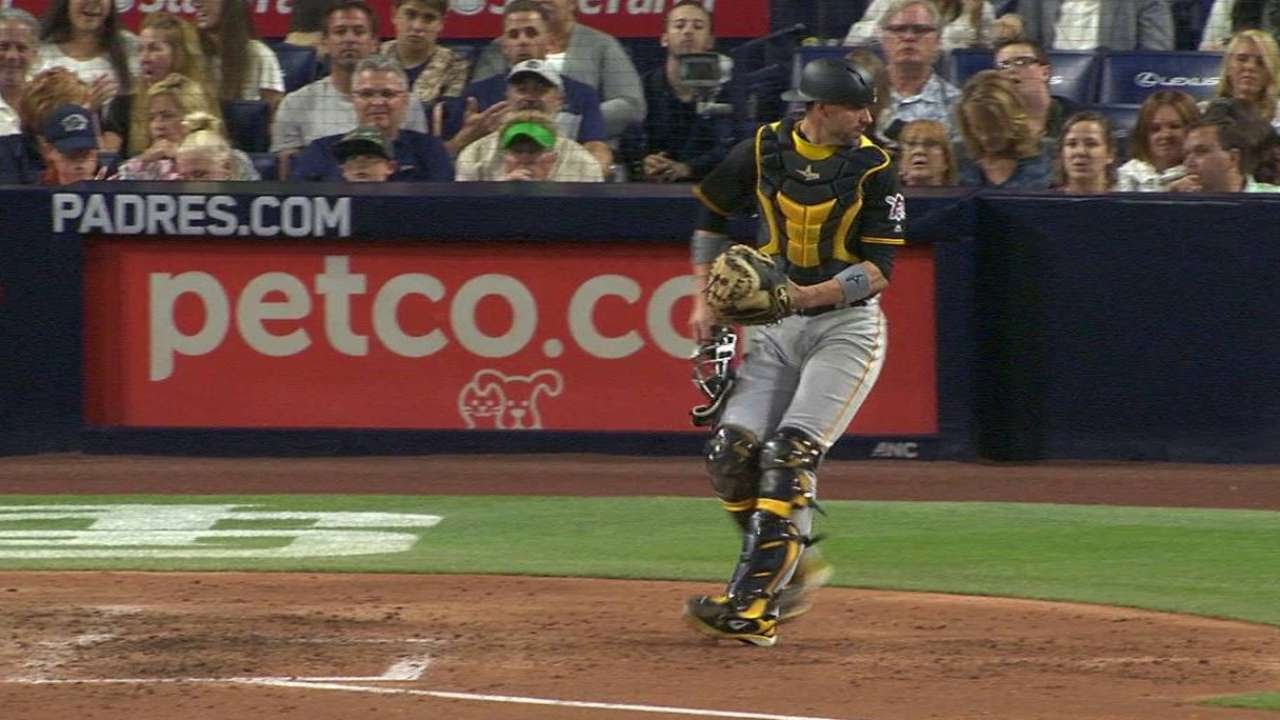 Wild pitch somehow winds up in umpires pocket during Pirates at Padres