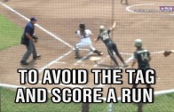 Army softball player jumps over catcher to score run