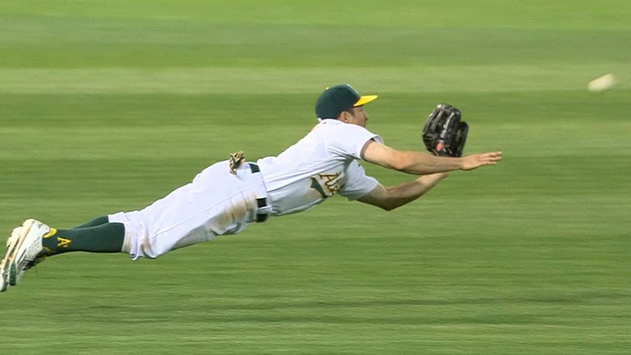 Billy Burns goes full extension for the diving catch