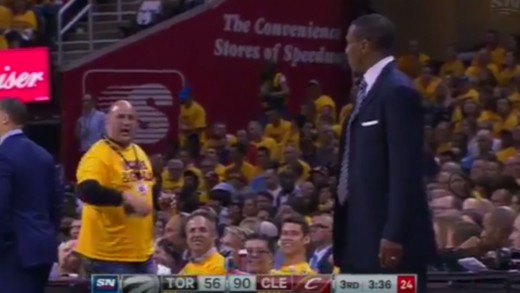 Dwane Casey goes at it with a Cavs fan on the sidelines