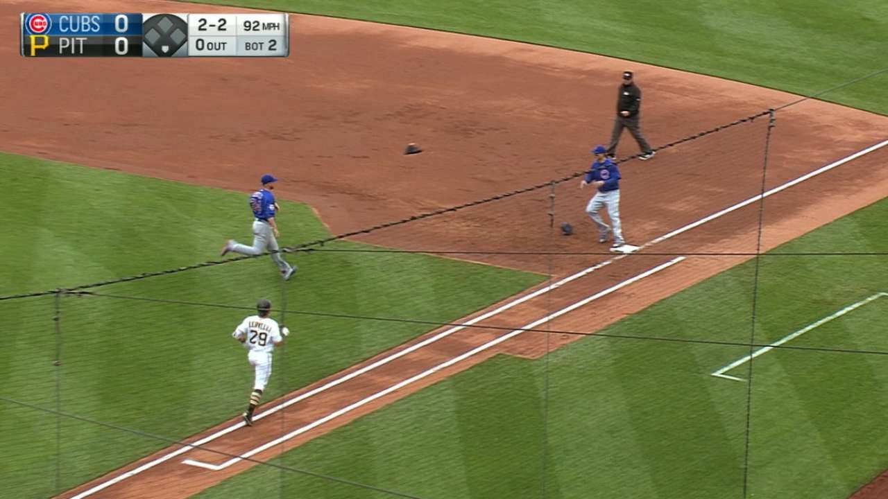 Jon Lester throws his glove with the baseball in it it