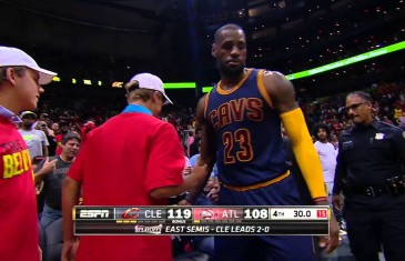 LeBron James crashes into a fan after being shoved