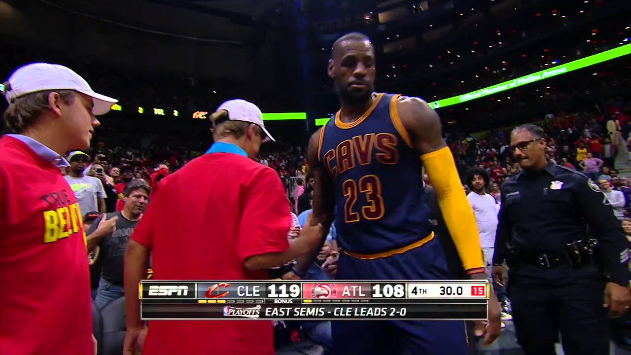 LeBron James crashes into a fan after being shoved