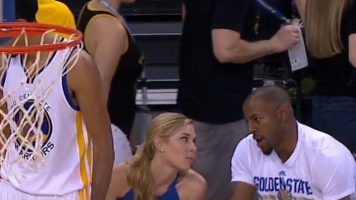 Andre Iguodala seen talking to a fan during Game 2