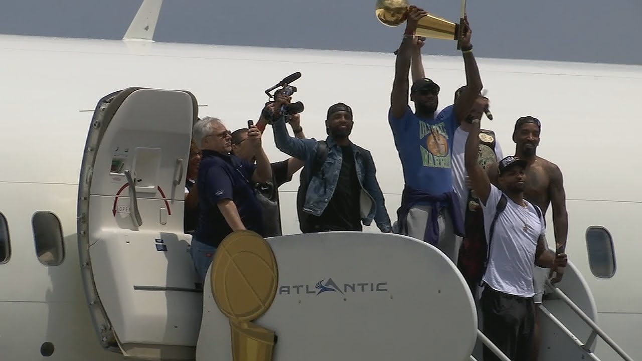 Cavaliers arrive in Cleveland for Championship Celebrations