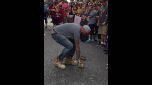 Cavs fan literally eats Horse Shit during Cavs Championship parade