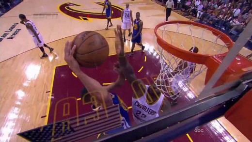 LeBron James blocks Steph Curry after the whistle