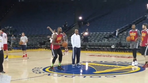 LeBron James casually sinks a half court shot