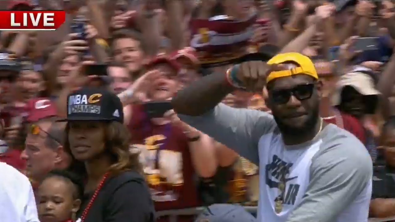 LeBron James greets the Cleveland crowd in his motorcade