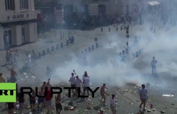 Riot police & England fans clash ahead of Russia match