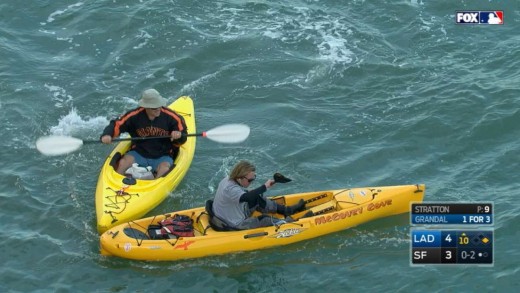 Two kayaks race for foul ball in McCovey Cove