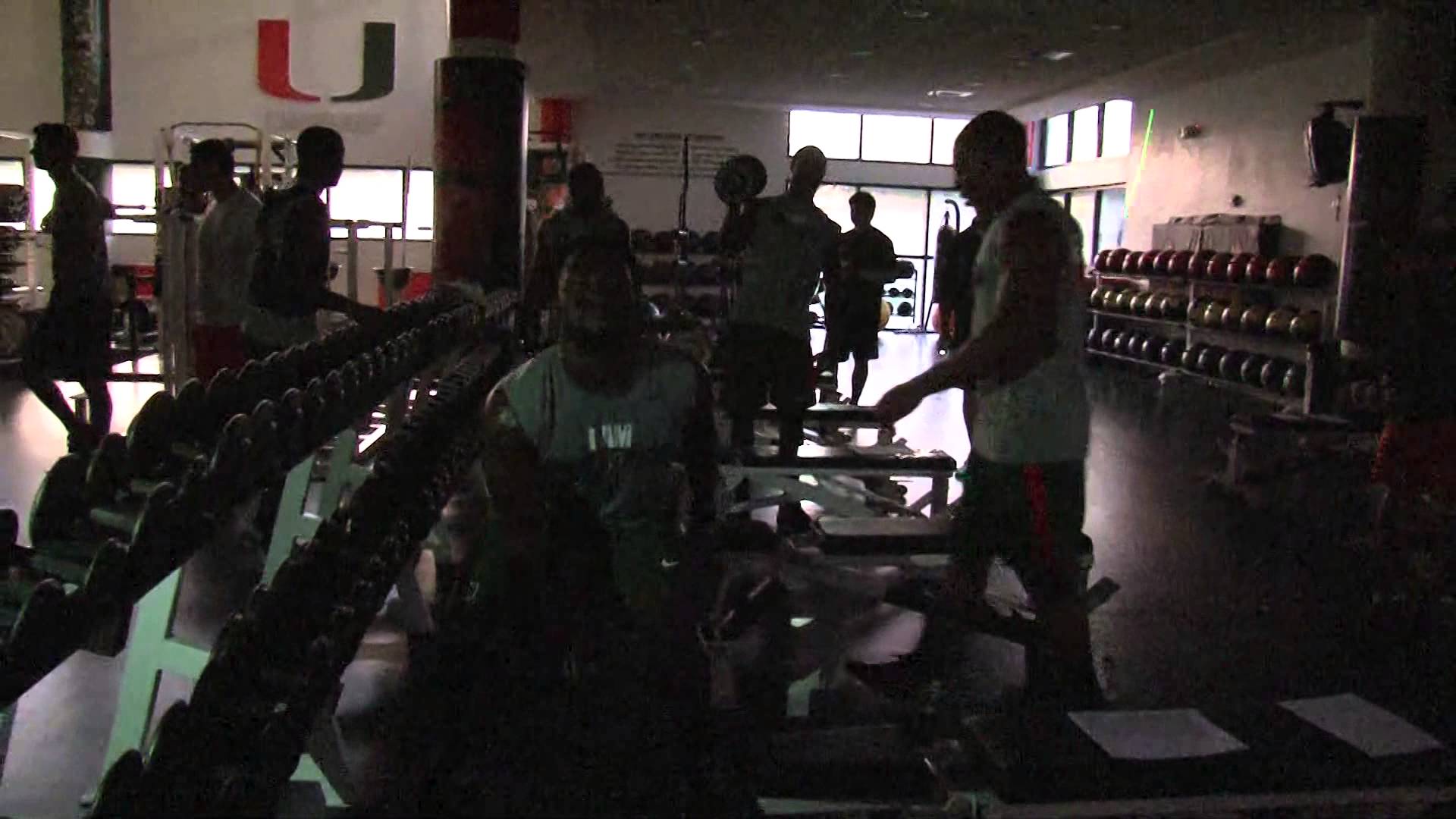 Univeristy of Miami football works out with Live DJ & Strobe Lights at 5:30am