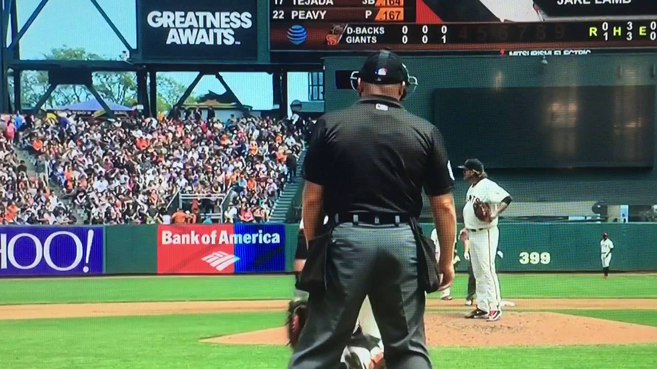 Buster Posey throws ball into Jake Peavy's glove while he's not looking