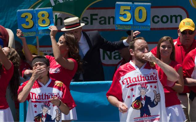 Joey Chestnut eats 70 hot dogs at the 2016 Nathan's annual hot dog eating competition