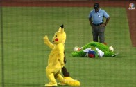 Philly Phanatic captures Pikachu during Phillies game