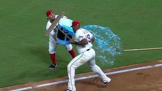 Adrian Beltre expertly dodges Gatorade shower by broom