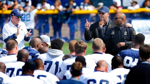 Dallas Cowboys walk out with Dallas Police & Family Members at Training Camp