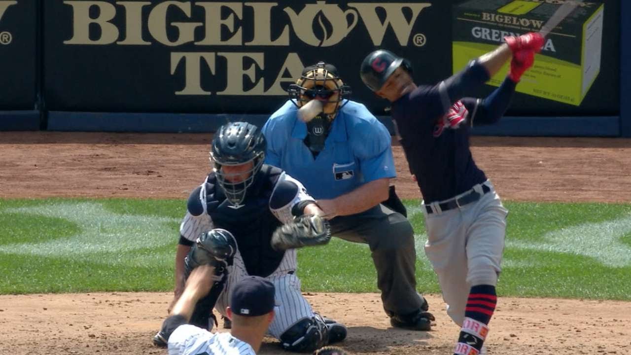 Francisco Lindor hits baseball off of catcher's mask