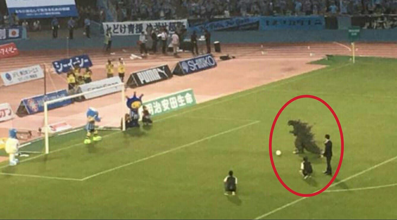 Godzilla attempts a penalty kick in Japan