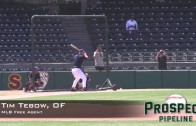 Tim Tebow performs baseball drills for MLB scouts