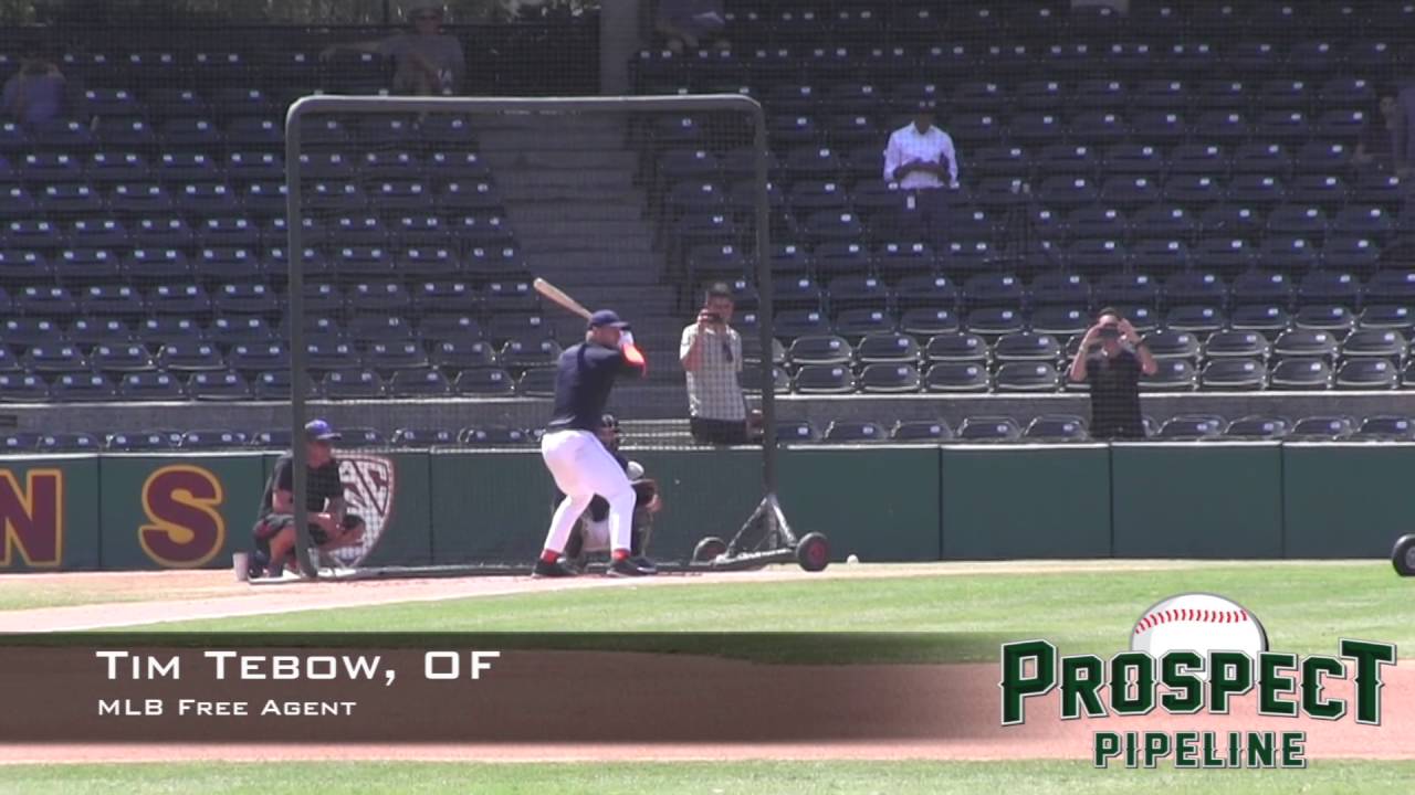 Tim Tebow performs baseball drills for MLB scouts